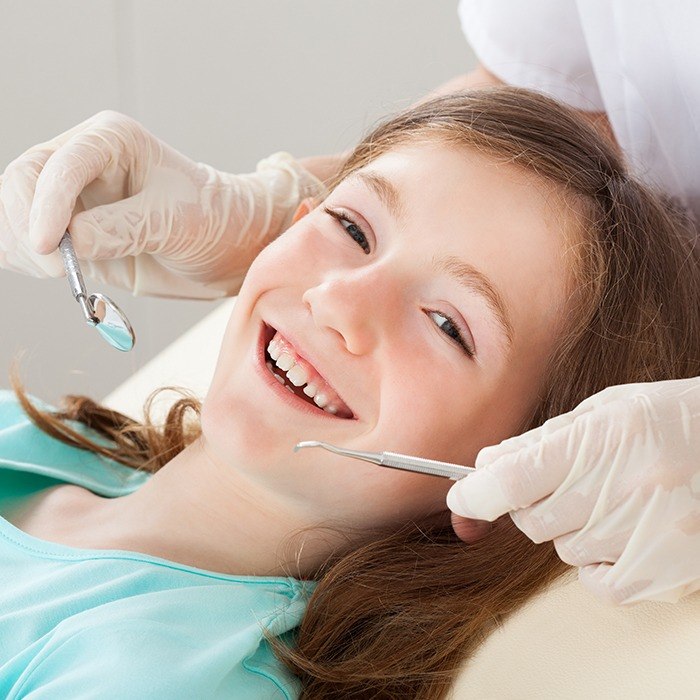 Smiling child during dental exam