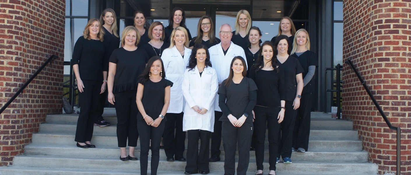 Dental Wellness of Lexington team standing outside of office