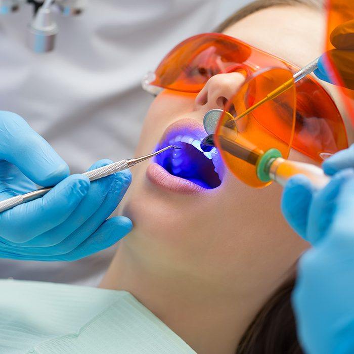 Patient receiving dental bonding