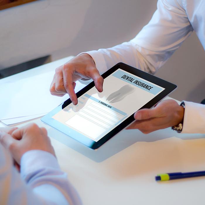 Dental insurance forms on tablet computer