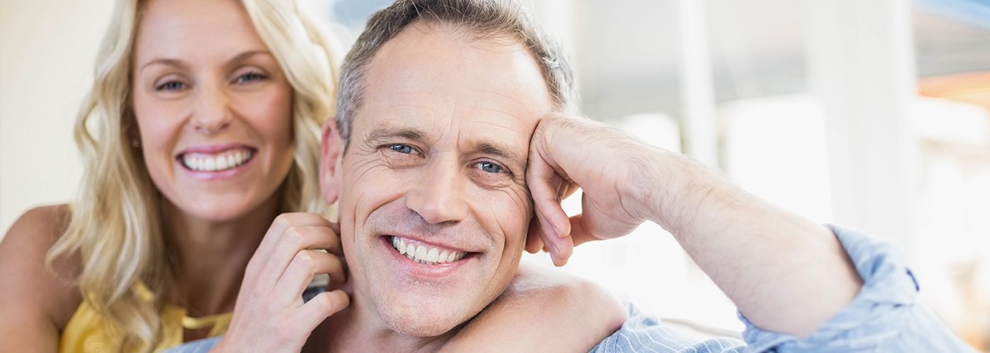 Smiling older man and woman