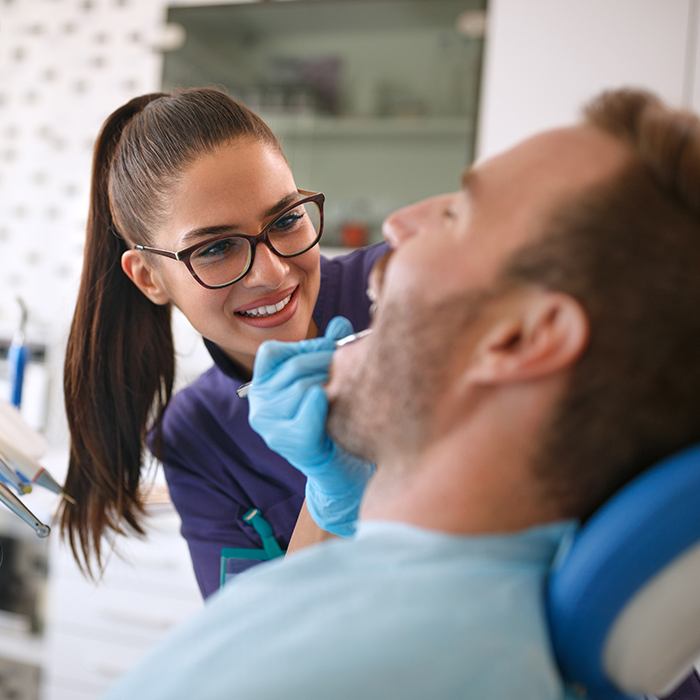 Man receiving dental exam