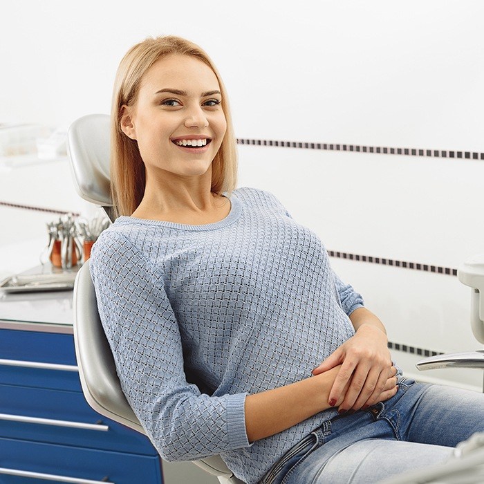 Smiling woman in dental chair