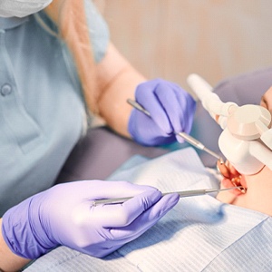 A young child receiving nitrous oxide in Lexington for a dental cleaning