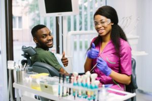 emergency dentist treating a patient