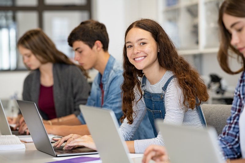 teenager smiling while in school