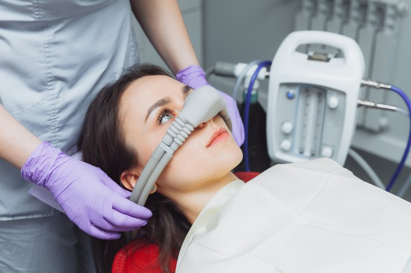 woman wearing a nitrous oxide mask