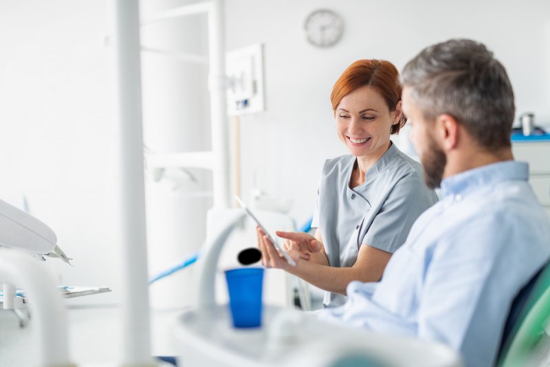 Patient talking to their dentist